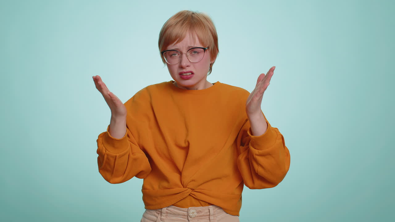 Young blonde woman loses becoming surprised by lottery results bad fortune loss unlucky news