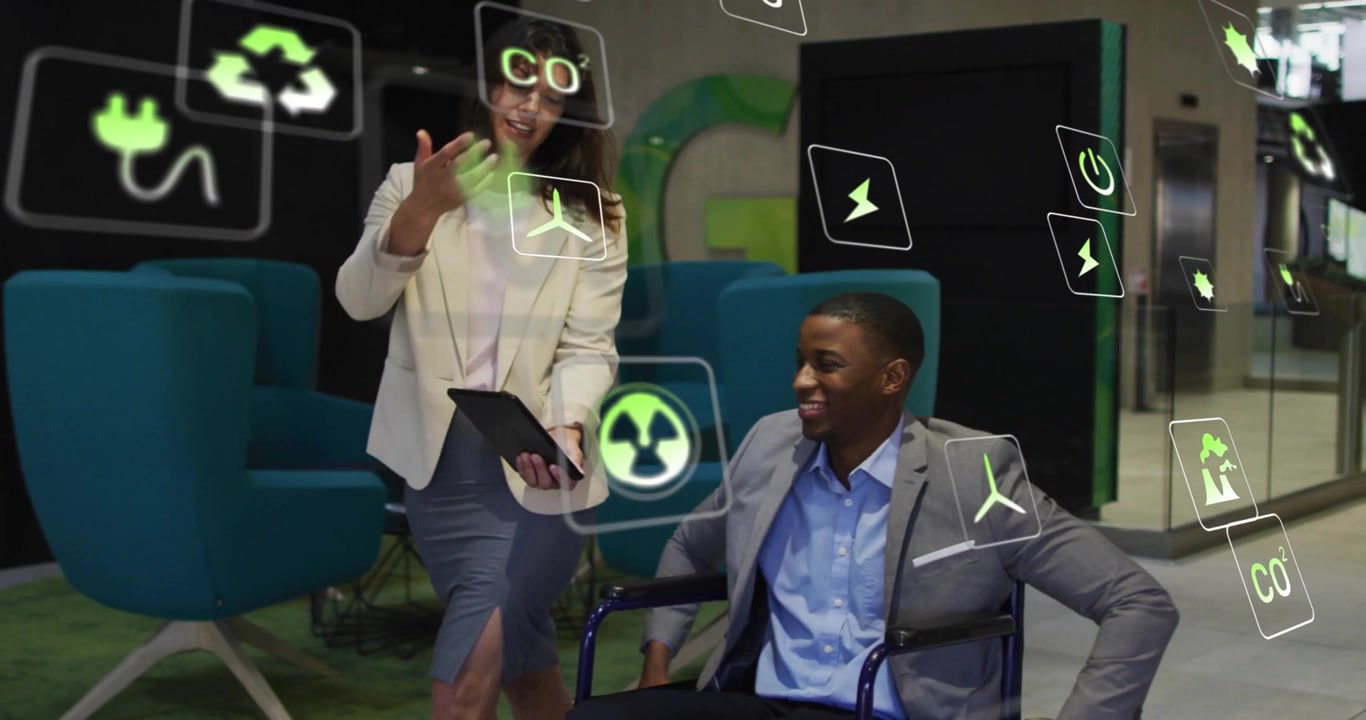 Female exec tapping tablet and animating green energy icons orbiting colleague at lounge