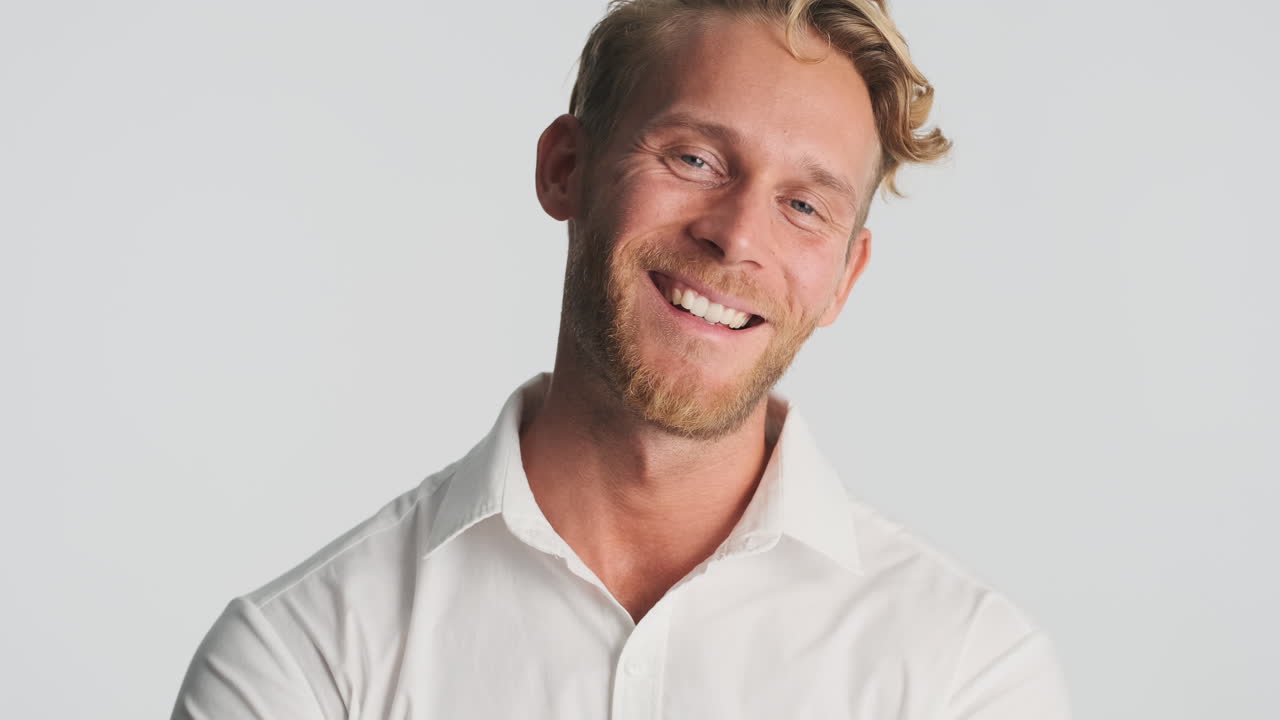 Happy bearded man posing