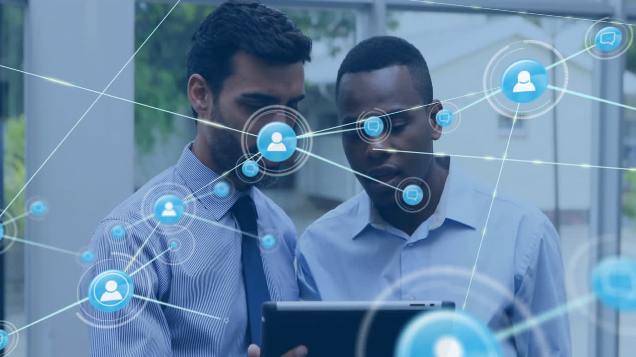 Animation of network of connections with people icons over diverse business people with tablets