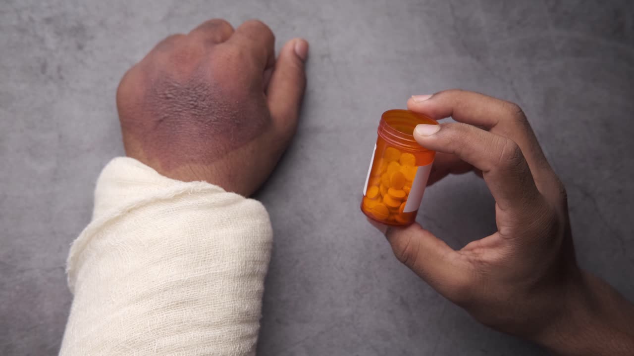 brazo lesionado con medicación