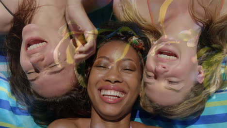 composite video of three diverse girls smiling against flowers in the garden