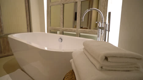 towel with bath tub in luxury bathroom