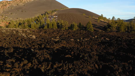 drone flight over one of oldest volcanic lava mountains on earth