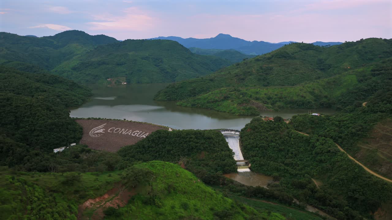 Wide aerial view of El Carrizo Dam and mountains in Jalisco, Mexico