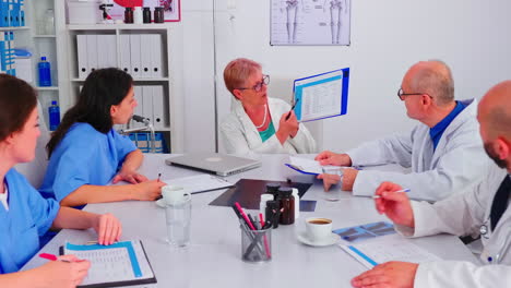 Medical-women-practitoner-writing-notes-on-clipboard