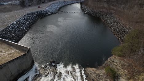 An-aerial-view-over-waterfalls-on-a-cloudy-day-in-upstate-New-York