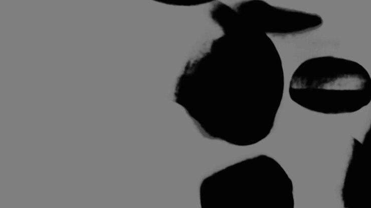 Black Ink Spreading and Bleeding on White Surface