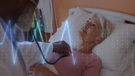 animación de datos cardíacos sobre un médico afroamericano con una paciente femenina