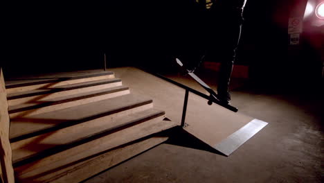 skater doing crook down handrail