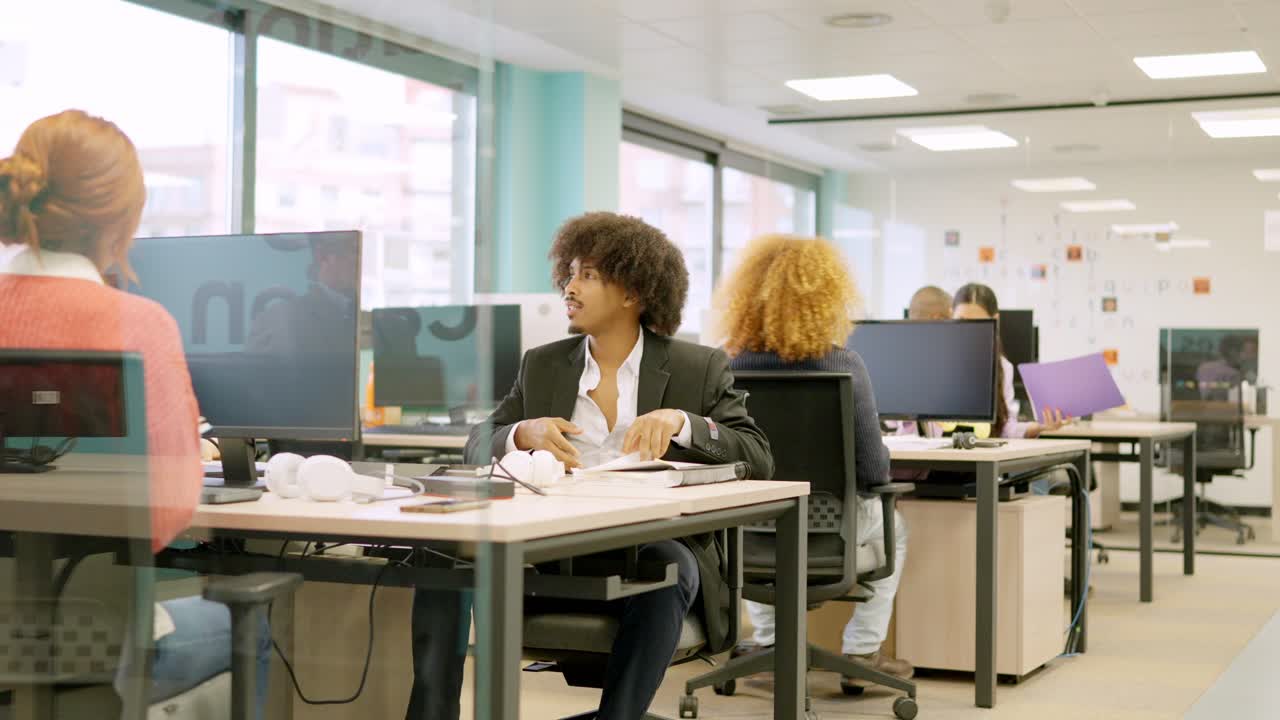 Coworkers standing up and leaving the office