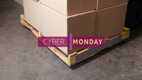 animation of cyber monday text over boxes in warehouse