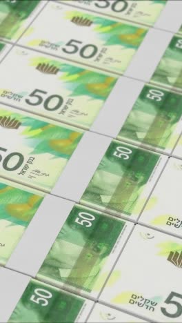video verticale di banconote di 50 nuovi shekel israeliani stampate da una pressa monetaria