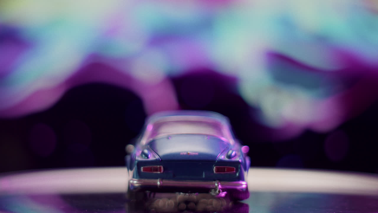 Blue Toy Car with Abstract Bokeh Background