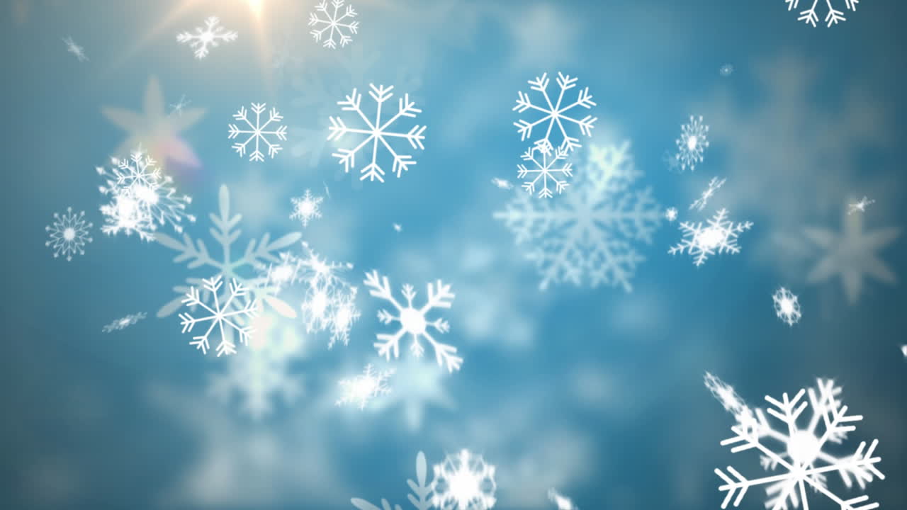 Digital animation of snow flakes falling against bright spot of light on blue background