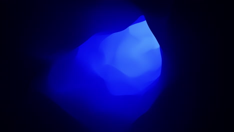 captivating blue light illuminates mysterious cave interior