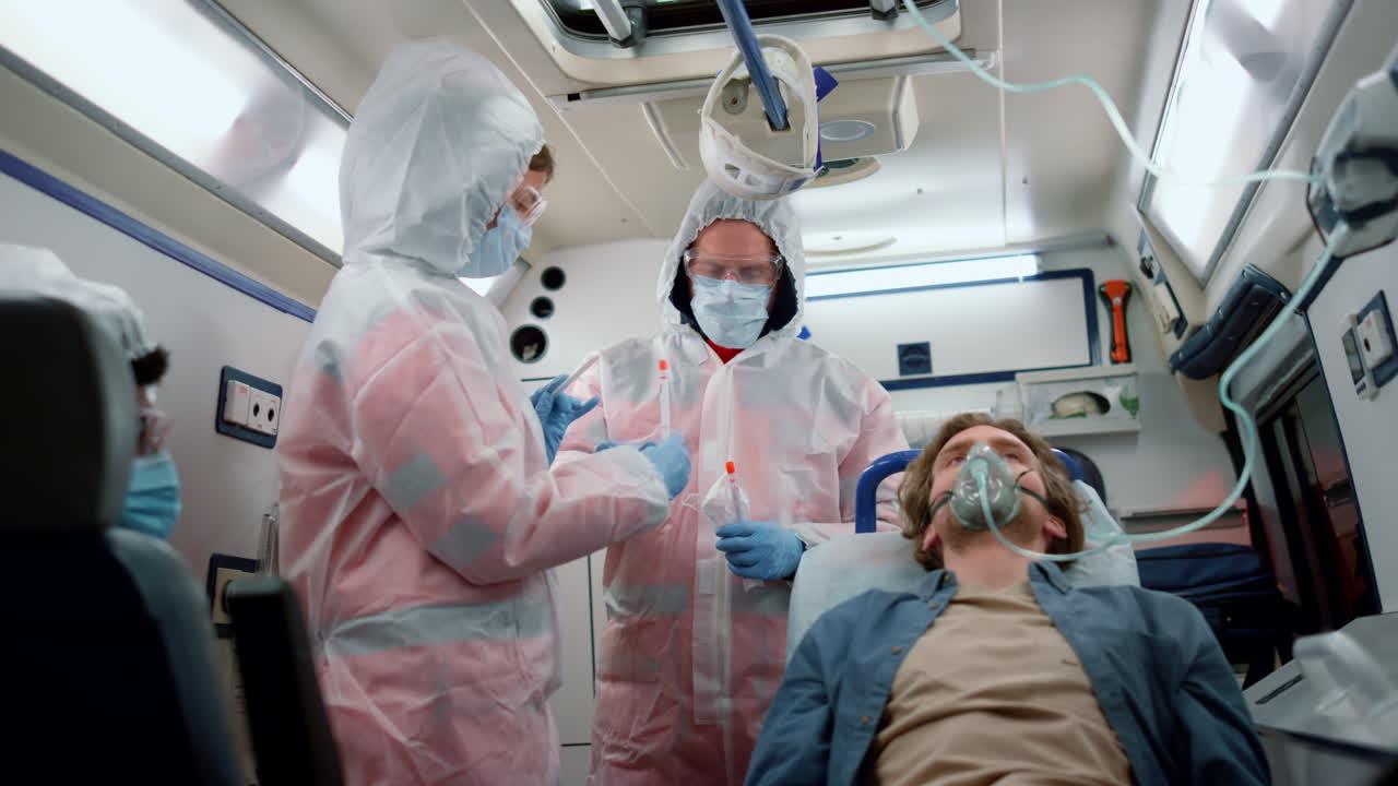 Multiethnic paramedic team holding samples of coronavirus test