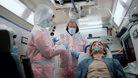 multiethnic paramedic team holding samples of coronavirus test