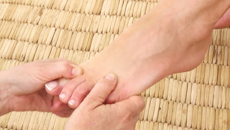 womans feet being massaged