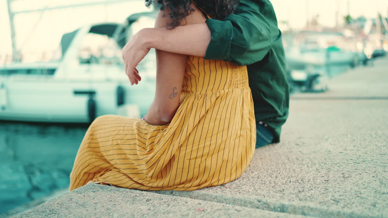 Affectionate couple embracing near the marina
