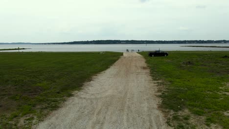 Sideways-movement-over-dusty-gravel-boat-launch-road