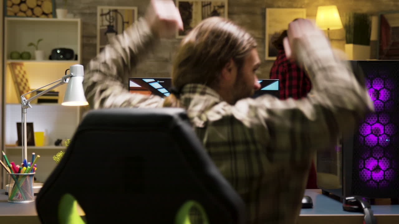 Man playing video games on computer