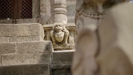 bhaktapur stone statue in a nepal temple, close up detail of statues in bhaktapur ancient city unesco world heritage site, a holy and sacred religious place popular as a tourist destination