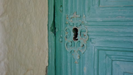 antique church door lock with a metal pattern with a cross medium shoot