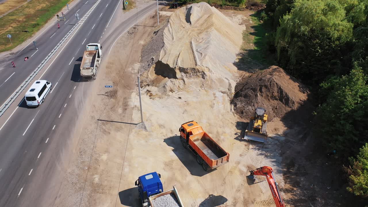 New road construction site. Process with heavy equipment at on the construction site