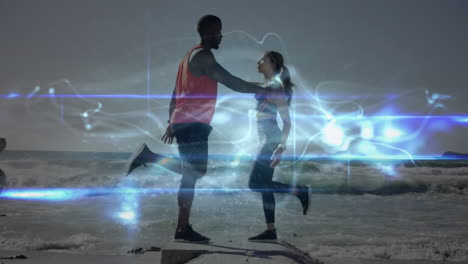 animation of glowing light over couple exercising on beach