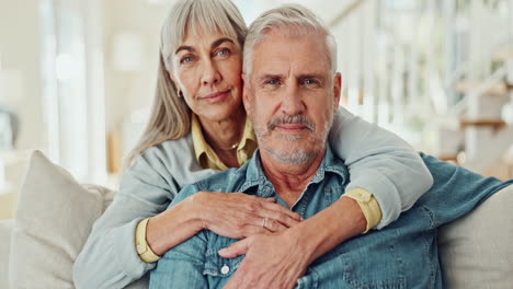 affectionate senior couple embracing at home