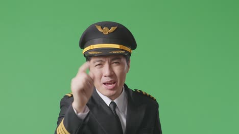 angry pilot on green screen