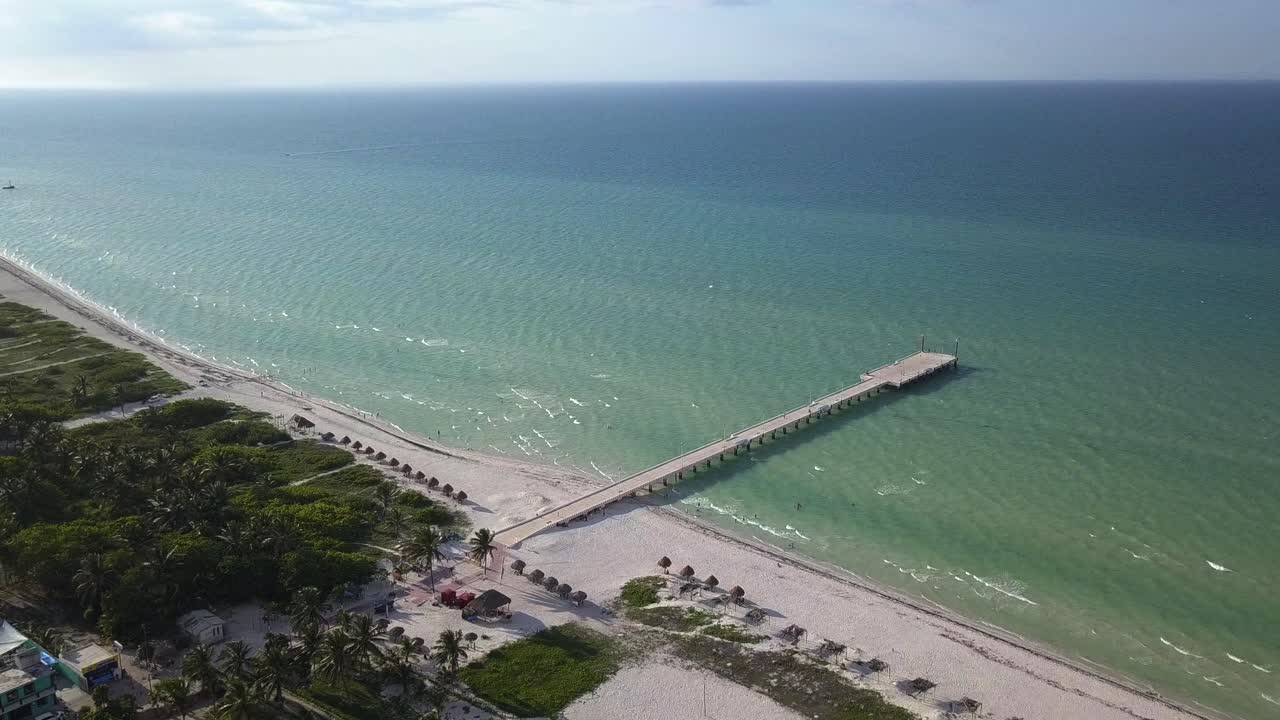 AERIAL: Pier in white sand beach in Mexico