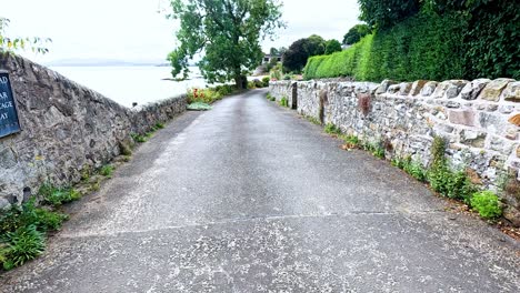 a quiet road by the sea in scotland