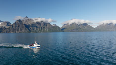 Aerial-View-Of-Cruising-Fishing-Boat-Near-Lyngen-Alps-During-Daytime-In-Northern-Norway