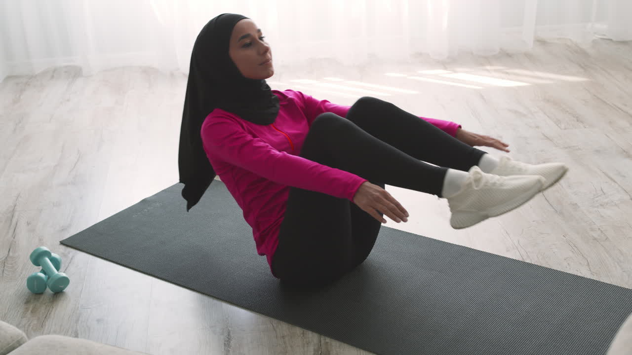 Woman resting after workout at home
