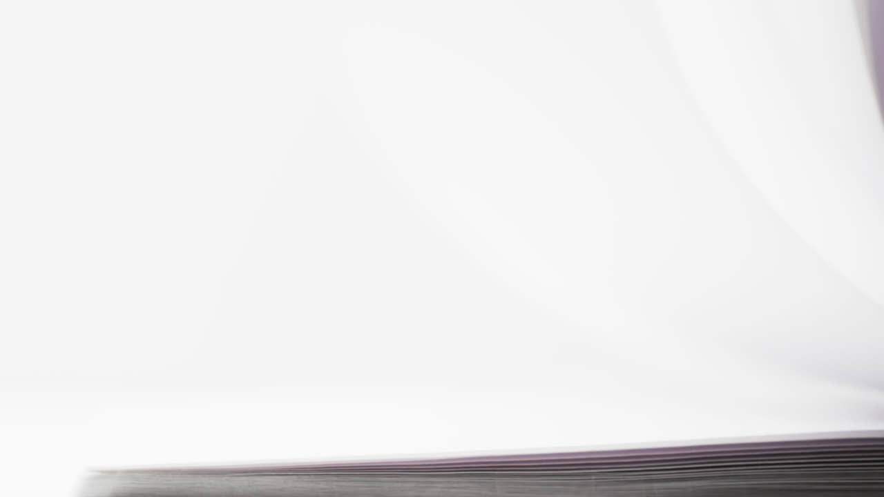 Micro of notebook pages and copy space on white background