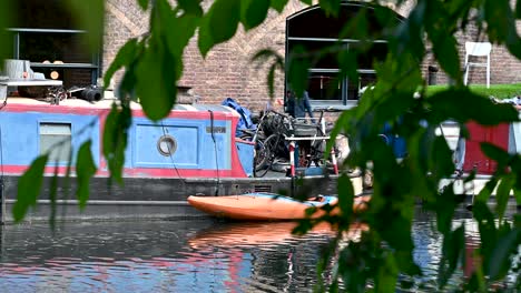 walking past a small canoe past in london, united kingdom