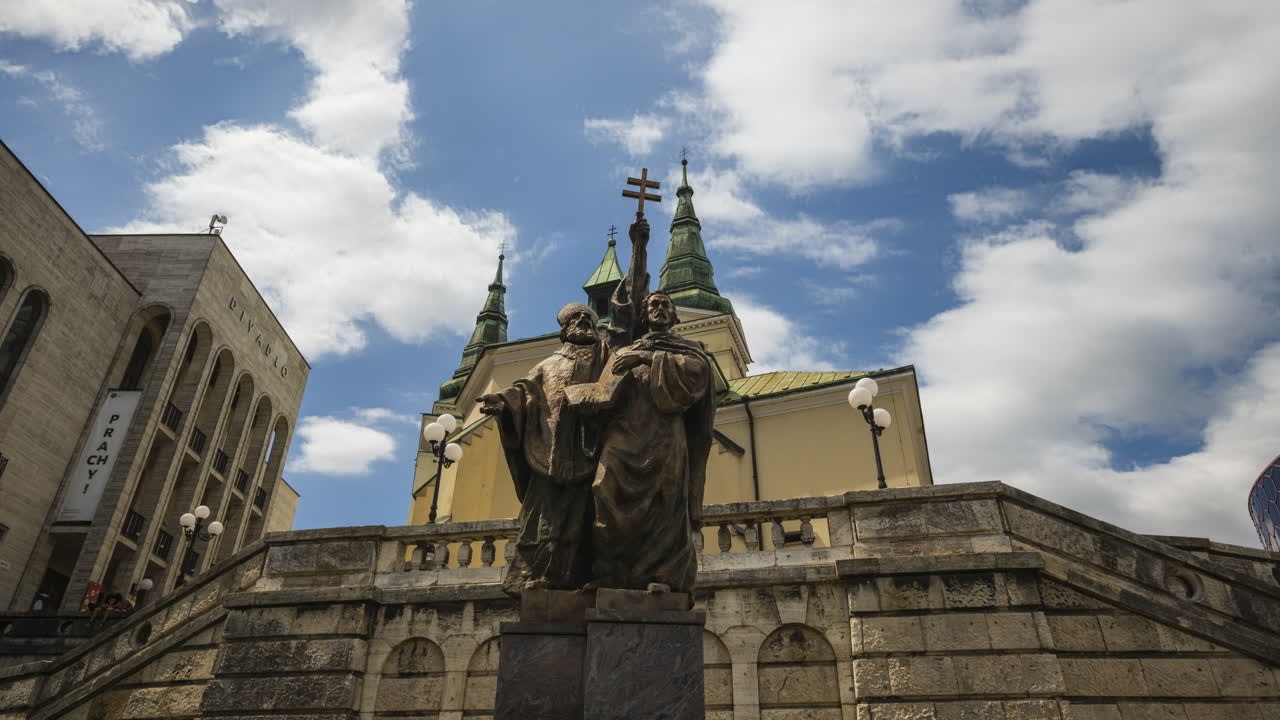 Time Lapse footage of Historical Žilina City Centre with Cyril and Method Statue and Catholic Church, Slovakia.