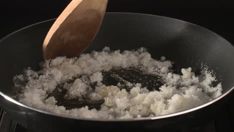 melted sugar is boiling in a pot on gas stoves, making of caramel for cake and desserts - high speed time lapse