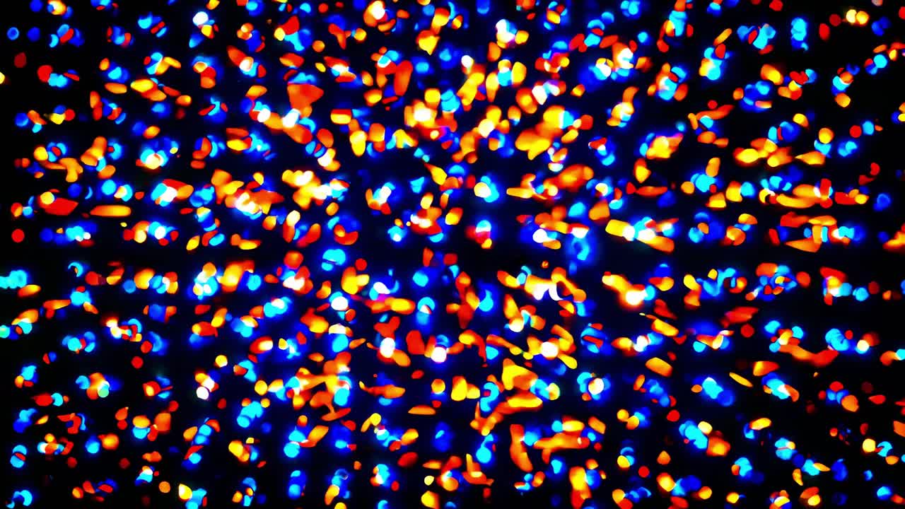 Colorful bokeh lights are creating a vibrant and electrifying dance effect against a dark background, perfect for festive or celebratory designs