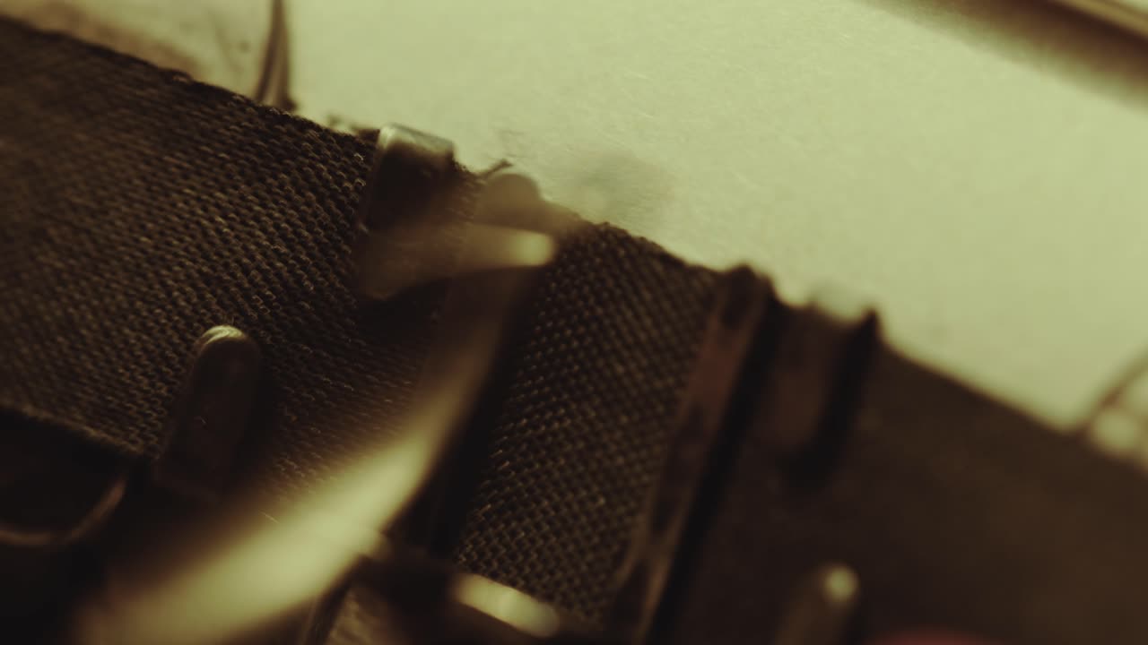 Printing In God We Trust Phrase on Paper with Typewriter