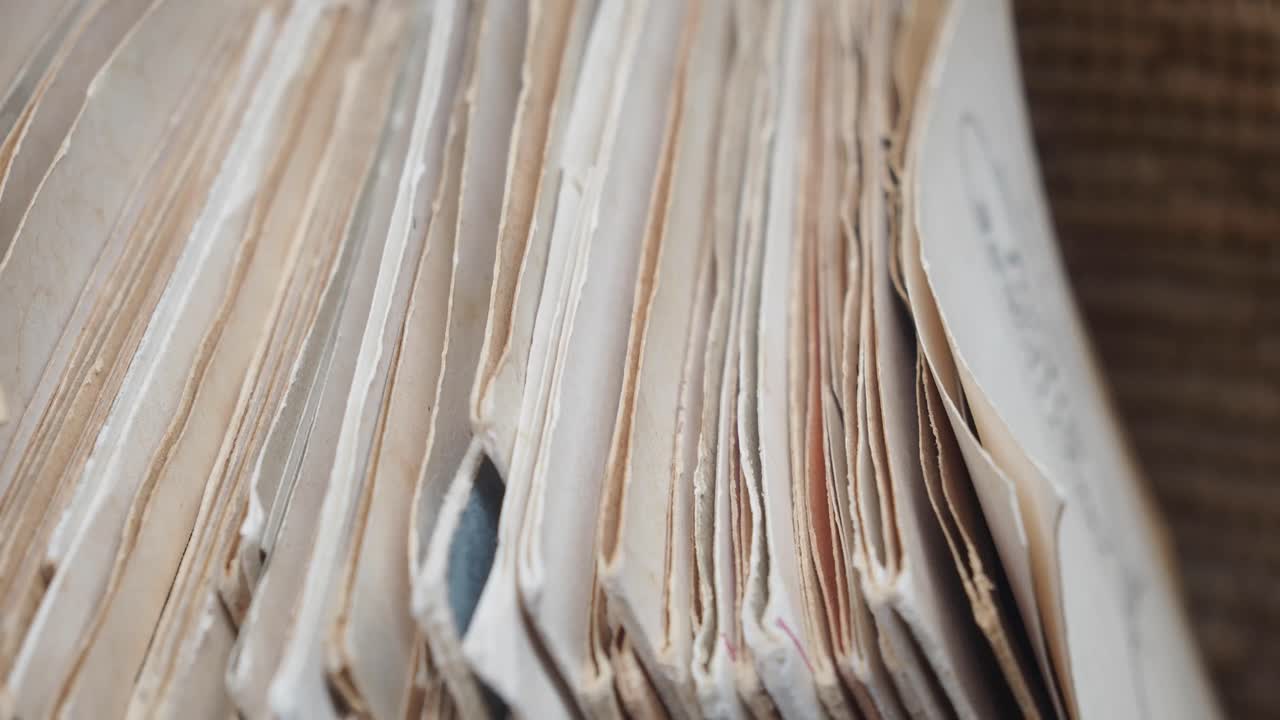 Close-up of old, stacked paper documents