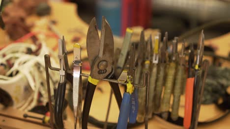 detail of pliers on the stand in workroom - garage