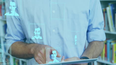 using tablet, man interacting with digital facial recognition animation interface