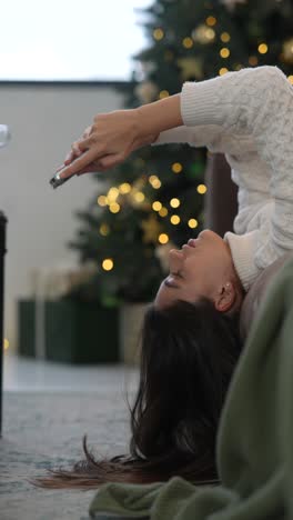 young woman relaxing at christmas