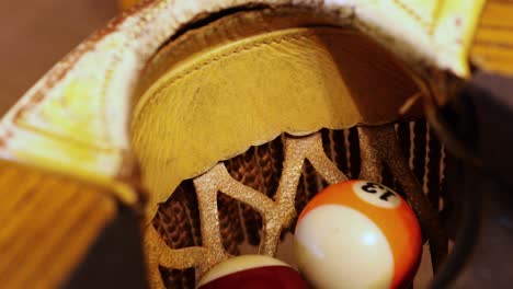 Close-Up-Of-Billiard-Ball-Falling-Into-The-Billiard-Pocket