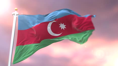 azerbaijan flag waving at wind in slow at sunset, loop