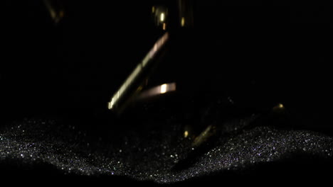 300-BLK-And-9mm-Parabellum-Bullets-Falling-Into-Bullet-Grains