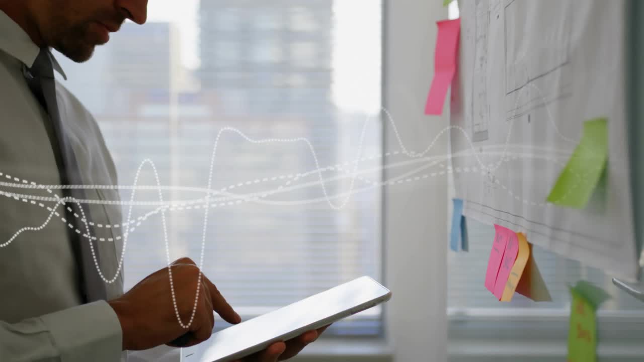 Biz PM tapping pad while animated wave sweeping over plan, studying notes, marking plan for review